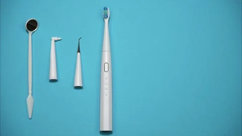 Dental Kit on blue background. Copy space for text. Stop motion Stock-Footage 271298934