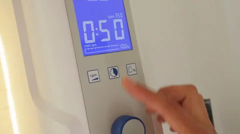 Dental laboratory vacuum mixer, timer setting Stock Footage 33831514
