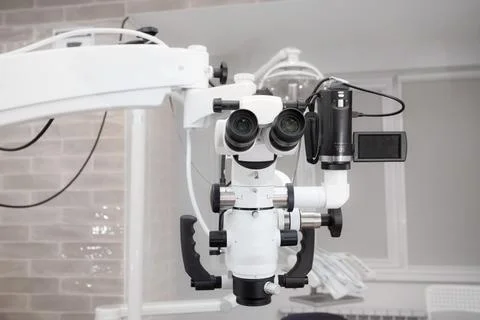 Dental microscope with video camera. against the background of modern dentistry Stock Photos
