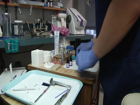 Dental Nurse Arranges Work Station Stock Footage 1099570