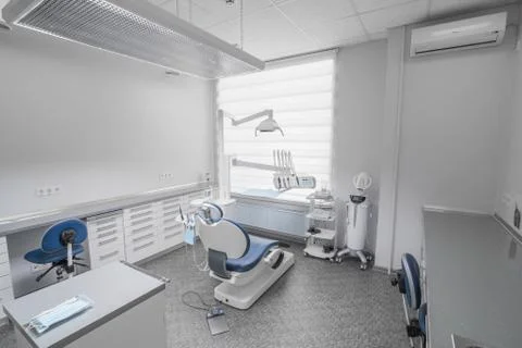 Dental office with chair and equipment Stock Photos
