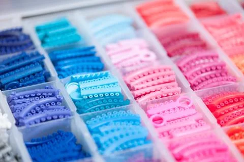 Dental plastic bracket for retainer Stock Photos