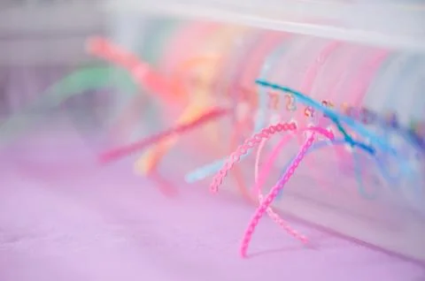 Dental plastic bracket for retainer Stock Photos