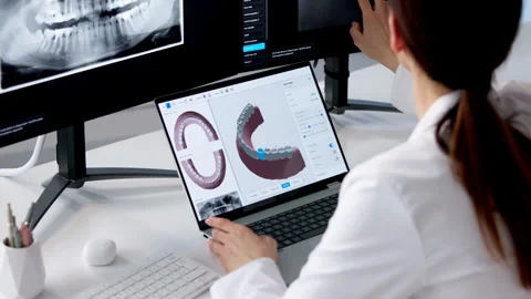 Dental Professional Using Computer Technology Stock Footage 330254088