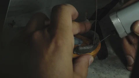 Dental prosthesis, artificial tooth, prosthetic, hands working on the denture Stock-Footage 95846558