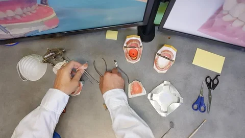 Dental prosthesis laboratory with dentures Stock Footage 129564865