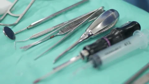 Dental Surgery Equipment Lined Up On Table Stock Footage 148492957