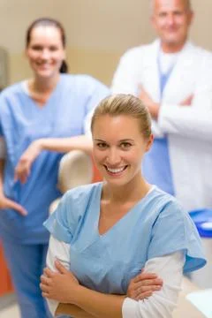 Dental team in stomatology clinic smiling staff Stock Photos