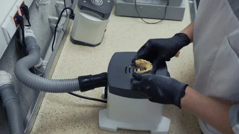 Dental technician crafting prosthesis in laboratory Stock Footage 336659093