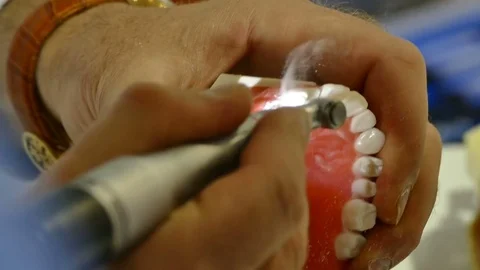 Dental technician doing partial dentures in the lab Vídeo Stock 73669382