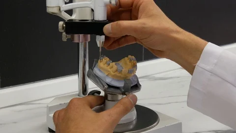 Dental technician grinds the model Video stock 91975286