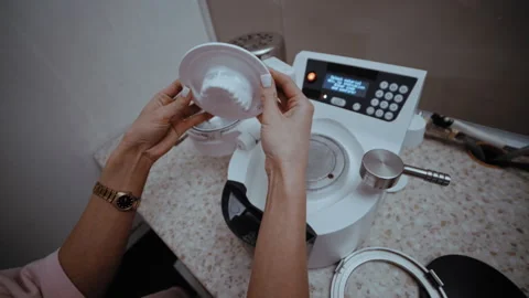 Dental technician preparing gypsum model for casting machine Vídeo Stock 336628293