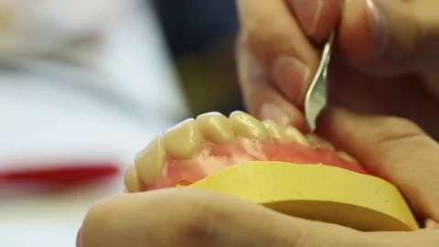 Dental technician at work in a laboratory Stock Footage 73269639