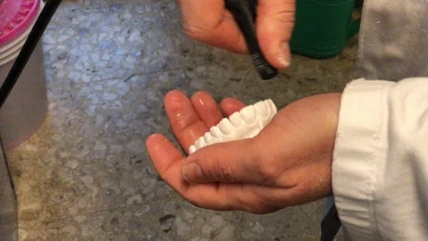 Dental technician working on brackets Stock Footage 122095973