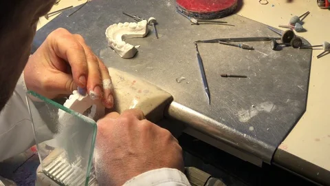 Dental technician working on brackets Stock Footage 122096078