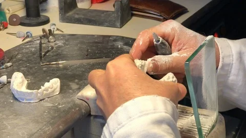 Dental technician working on brackets Stock Footage 122096850