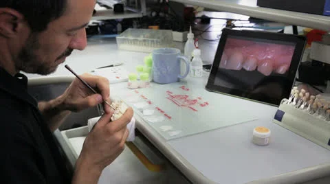 Dental technician working on prosthesis Stock Footage 24706528