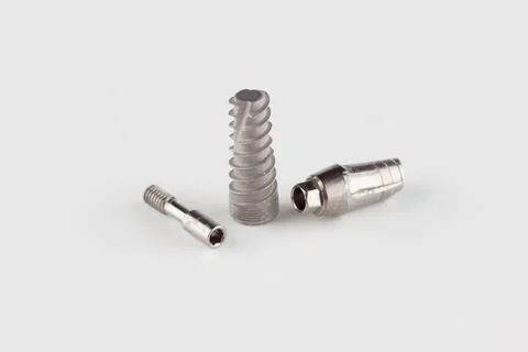 Dental titanium implant with locking elements Stock Photos