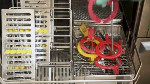 Dental tools being sterilized through machine Stock Footage 211592019