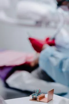 Dental tools close up on the background of the workflow in the dental office Stock Photos