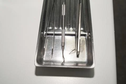 Dental tools, twissors, hooks, close up Stock Photos