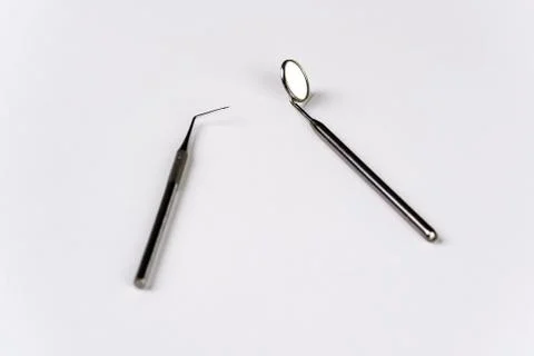 Dental tools on a white table Stockfoto's