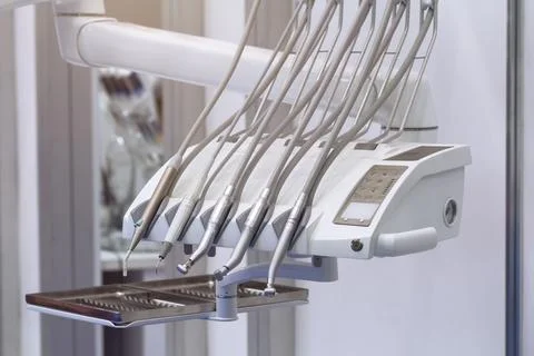 Dental unit with upper supply of instruments. White dental unit Stock Photos