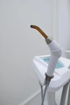 Dental UV curing lamp for polymerization of dental materials Stock Photos