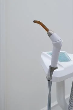 Dental UV curing lamp for polymerization of dental materials Stock Photos
