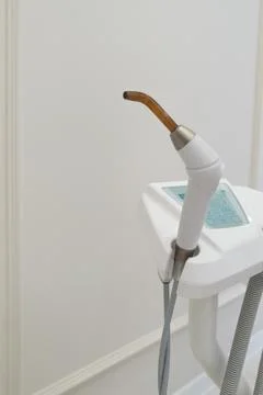 Dental UV curing lamp for polymerization of dental materials Stock Photos