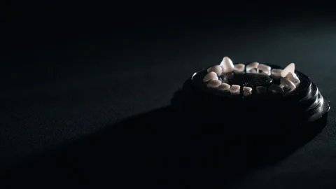 Dental veneers presentation on black background Stock Footage 112130526