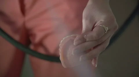 Dental worker cleaning denture , slow motion Stock-Footage 48920680
