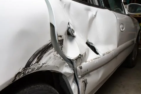 Dented up car from a wreck Stock Photos
