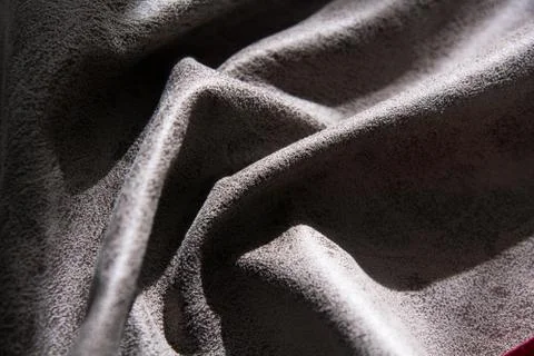 Dented fabric with texture highlighted by light Stock-Fotos