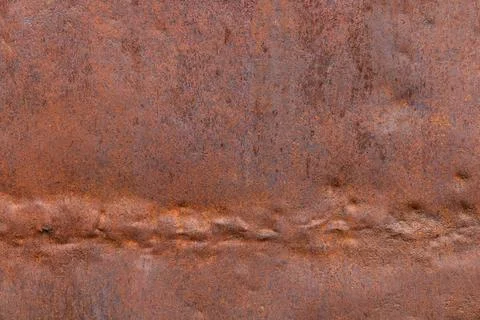 Dented rusty sheet metal texture Stock Photos