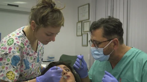 At the Dentist with assistant Stock Footage 113190377