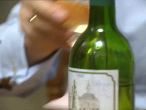 Dentist Bryan Harvey having dinner with wife and working on computer, UK 1993 Stock Footage 134025877