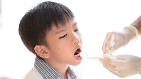 Dentist checking child teeth Stock Footage 67852914