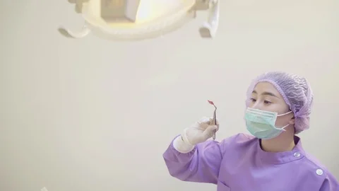 Dentist checking equipment teeth dental care oral for treat patient Видео 117546406