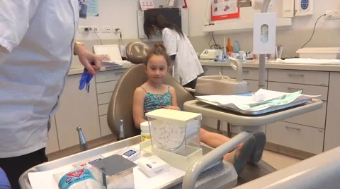 Dentist checking a kid Video stock 58811331