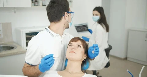 Dentist Checking Lady Patients Teeth 動画素材 119327147