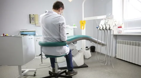 The dentist checks the mouth using tools. Point of view of patient in chair. Stock Footage 62134126