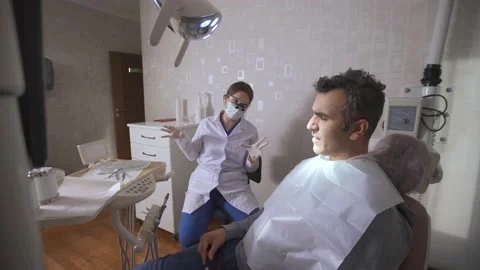 The dentist checks the patient's teeth. Stock Footage 204065044