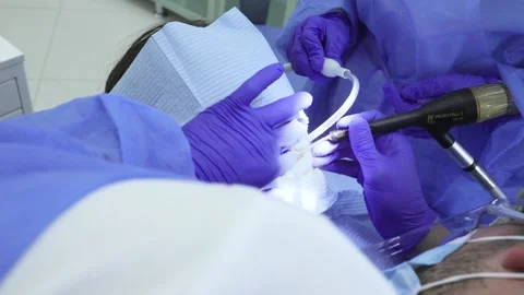 Dentist close-up tool treating teeth Professional doctor stomatologist Stock Footage 153939084