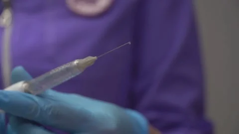 Dentist collects and uses device for computer and electronic tooth anaesthesia 库存影片 148067853