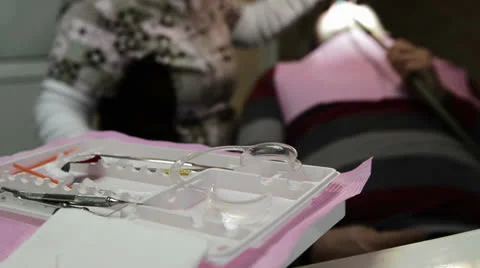 Dentist doing dental work 스톡 동영상 24820525