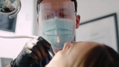 Dentist drilling in teeth of the patient Stock Footage 274141052