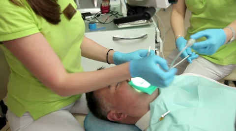 Dentist Exam With Microscope Video stock 63314470
