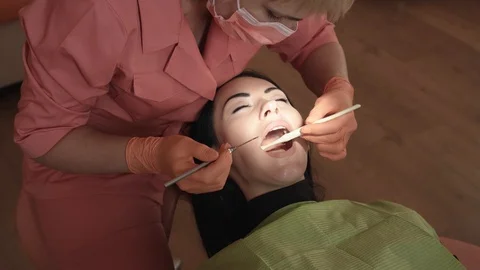 Dentist Examines And Heals The Teeth. Stock Footage 91677682