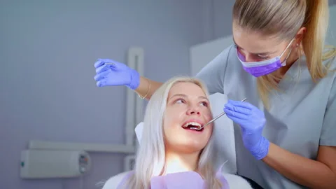 Dentist Examining Teeth With Medical Instruments Medical Stomatology Concept Stock Footage 143148199